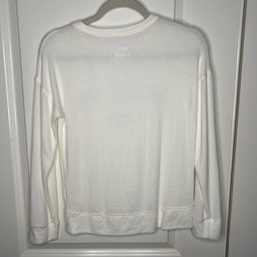 Justice “believe the hype” white fuzzy sweater
